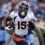 
              Denver Broncos wide receiver Jalen Virgil (15) runs the ball for a touchdown after a catch during the first half of an NFL football game against the Tennessee Titans, Sunday, Nov. 13, 2022, in Nashville, Tenn. (AP Photo/Mark Humphrey)
            