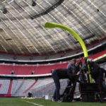 
              Workers prepare a goal inside the FC Bayern Munich soccer stadium Allianz Arena in Munich, Germany, Wednesday, Nov. 9, 2022. The Tampa Bay Buccaneers are set to play the Seattle Seahawks in an NFL game at the Allianz Arena in Munich on Sunday. (AP Photo/Matthias Schrader)
            