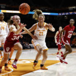 
              Indiana guard Grace Berger (34) battles for the ball with Tennessee forward Tess Darby (21) during the first half of an NCAA college basketball game, Monday, Nov. 14, 2022, in Knoxville, Tenn. (AP Photo/Wade Payne)
            