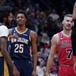 
              New Orleans Pelicans forward Brandon Ingram (14) laughs with guard Trey Murphy III (25) as Chicago Bulls guard Goran Dragic (7) reacts, after Ingram was fouled in the second half of an NBA basketball game in New Orleans, Wednesday, Nov. 16, 2022. The Pelicans won 124-110. (AP Photo/Gerald Herbert)
            