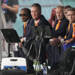 
              Head coach Louis van Gaal of the Netherlands of the Netherlands, second left, watches his team during the World Cup group A soccer match between the Netherlands and Ecuador, at the Khalifa International Stadium in Doha, Qatar, Friday, Nov. 25, 2022. (AP Photo/Martin Meissner)
            