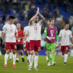 
              Denmark's Pierre-Emile Hojbjerg waves to fans at the end of the World Cup group D soccer match between France and Denmark, at the Stadium 974 in Doha, Qatar, Saturday, Nov. 26, 2022. (AP Photo/Frank Augstein)
            
