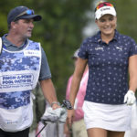 
              Lexi Thompson, right, has a laugh while walking to the third tee with her caddie during the final round of the LPGA Pelican Women's Championship golf tournament at Pelican Golf Club, Sunday, Nov. 13, 2022, in Belleair, Fla. (AP Photo/Phelan M. Ebenhack)
            