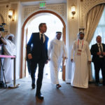 
              United States Secretary of State Antony Blinkin, center left, and Qatar Foreign Minister Mohammed Bin Adbulrahman Al Thani, center right, walk to a press conference at the Diplomatic Club, in Tuesday, Nov. 22, 2022. America's top diplomat criticized a decision by FIFA to threaten players at the World Cup with yellow cards if they wear armbands supporting inclusion and diversity. (AP Photo/Ashley Landis)
            