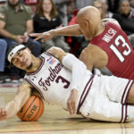 
              Fordham guard Darius Quisenberry (3) tries to maintain control of the ball as Arkansas guard Jordan Walsh (13) defends during the second half of an NCAA college basketball game Friday, Nov. 11, 2022, in Fayetteville, Ark. (AP Photo/Michael Woods)
            
