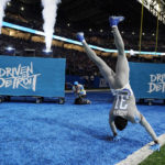 
              Detroit Lions safety Kerby Joseph performs a back flip during player introductions of an NFL football game against the Buffalo Bills, Thursday, Nov. 24, 2022, in Detroit. (AP Photo/Paul Sancya)
            