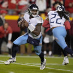 
              Tennessee Titans quarterback Malik Willis scrambles during the first half of an NFL football game against the Kansas City Chiefs Sunday, Nov. 6, 2022, in Kansas City, Mo. (AP Photo/Charlie Riedel)
            