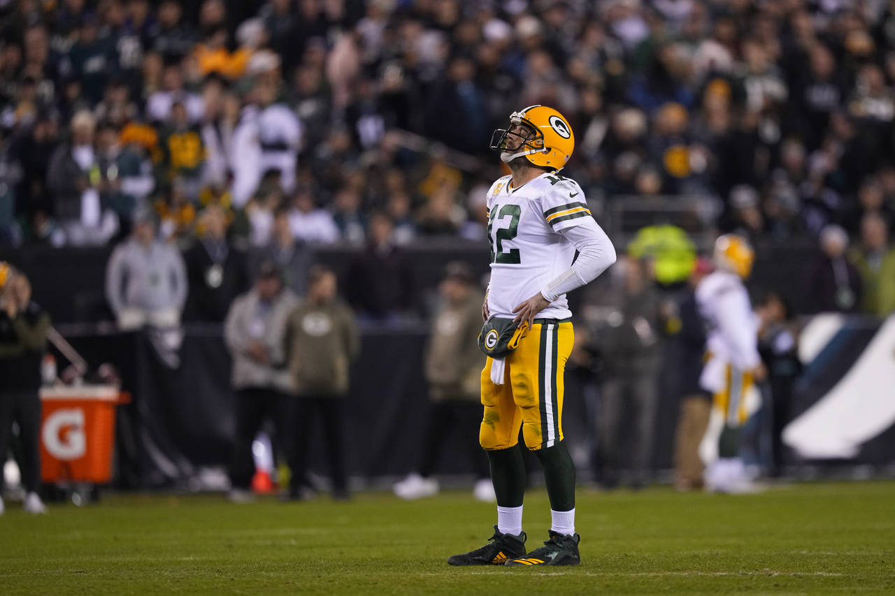 Green Bay Packers quarterback Aaron Rodgers reacts during the second half of an NFL football game a...