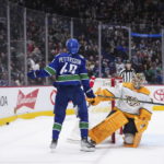 
              Vancouver Canucks' Elias Pettersson (40) looks up after being stopped by Nashville Predators goalie Juuse Saros on a shootout attempt during an NHL hockey game Saturday, Nov. 5, 2022, in Vancouver, British Columbia. (Darryl Dyck/The Canadian Press via AP)
            