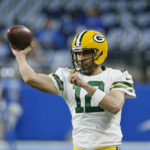 
              Green Bay Packers quarterback Aaron Rodgers throws during pregame of an NFL football game against the Detroit Lions, Sunday, Nov. 6, 2022, in Detroit. (AP Photo/Duane Burleson)
            