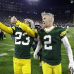
              Green Bay Packers' Jaire Alexander (23) and Mason Crosby (2) celebrate after the team's 31-28 overtime win in an NFL football game against the Dallas Cowboys Sunday, Nov. 13, 2022, in Green Bay, Wis. (AP Photo/Matt Ludtke)
            