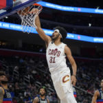 
              Cleveland Cavaliers center Jarrett Allen (31) dunks against the Detroit Pistons in the first half of an NBA basketball game in Detroit, Friday, Nov. 4, 2022. (AP Photo/Paul Sancya)
            