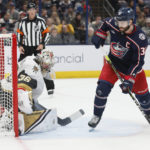 
              Vegas Golden Knights' Logan Thompson, left, makes a save against Columbus Blue Jackets' Boone Jenner during the second period of an NHL hockey game on Monday, Nov. 28, 2022, in Columbus, Ohio. (AP Photo/Jay LaPrete)
            