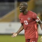 
              FILE - Canada's Atiba Hutchinson celebrates scoring his side's opening goal against El Salvador during a qualifying soccer match for the FIFA World Cup Qatar 2022 at Cuscatlan stadium in San Salvador, El Salvador, Feb. 2, 2022. Hutchinson was among 26 players picked for the World Cup roster Sunday, Nov. 13, by coach John Herdman. (AP Photo/Moises Castillo, File)
            