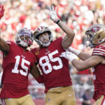 
              San Francisco 49ers wide receiver Jauan Jennings (15) celebrates after catching a touchdown pass with tight end George Kittle (85) and tight end Ross Dwelley during the first half of an NFL football game against the New Orleans Saints in Santa Clara, Calif., Sunday, Nov. 27, 2022. (AP Photo/Godofredo A. Vásquez)
            