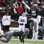 
              Washington State defensive back Jaden Hicks (25) celebrates a pass deflection by defensive back Derrick Langford Jr. (5) during the first half of an NCAA college football game against Arizona State, Saturday, Nov. 12, 2022, in Pullman, Wash. (AP Photo/Young Kwak)
            