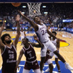 
              Kansas forward K.J. Adams Jr. (24) shoots during the first half of an NCAA college basketball game against Texas Southern Monday, Nov. 28, 2022, in Lawrence, Kan. (AP Photo/Charlie Riedel)
            