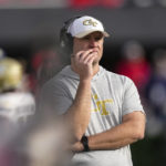 
              Georgia Tech interim head coach Brent Key looks on from the sideline during the second half of an NCAA college football game against Georgia, Saturday, Nov. 26, 2022 in Athens, Ga. (AP Photo/John Bazemore)
            