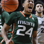
              Miami guard Nijel Pack (24) reacts in the second half of an NCAA college basketball game against Providence, Saturday, Nov. 19, 2022, in Uncasville, Conn. (AP Photo/Jessica Hill)
            