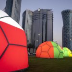 
              FILE - Domes featuring different national colors are displayed near the Doha Exhibition and Convention Center where soccer World Cup draw will be held, in Doha, Qatar, Thursday, March 31, 2022. Hosting the World Cup marks a pinnacle in Qatar's efforts to rise out of the shadow of its larger neighbors in the wider Middle East. (AP Photo/Darko Bandic, File)
            