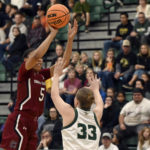 
              South Carolina forward Victaria Saxton (5) shoots over Cal Poly guard Maddie Willett (33) in the first half of an NCAA college basketball game, Tuesday, Nov. 22, 2022, San Luis Obispo, Calif. (AP Photo/Nic Coury)
            