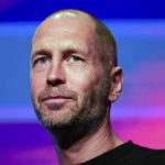 
              United States men's national team soccer coach Gregg Berhalter smiles, Wednesday, Nov. 9, 2022, in New York, as the team's roster for the upcoming World Cup in Qatar is announced. (AP Photo/Julia Nikhinson)
            