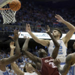
              North Carolina forward Armando Bacot (5), guard Seth Trimble, second from left, forward Pete Nance (32) and guard Caleb Love (2) battle College of Charleston forward Babacar Faye (35) for a rebound during the second half of an NCAA college basketball game Friday, Nov. 11, 2022, in Chapel Hill, N.C. (AP Photo/Chris Seward)
            