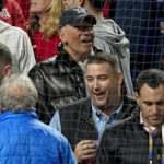 
              Singer Bruce Springsteen, top center, watches play during the seventh inning in Game 4 of baseball's World Series between the Houston Astros and the Philadelphia Phillies on Wednesday, Nov. 2, 2022, in Philadelphia. (AP Photo/David J. Phillip)
            