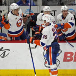 
              New York Islanders center Brock Nelson (29) is congratulated for his goal against the Chicago Blackhawks during the third period of an NHL hockey game Tuesday, Nov. 1, 2022, in Chicago. (AP Photo/David Banks)
            