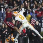 
              Tennessee defensive back Brandon Turnage (8) deflects a pass in the end zone intended for South Carolina wide receiver Antwane Wells Jr. during the first half of an NCAA college football game on Saturday, Nov. 19, 2022, in Columbia, S.C. (AP Photo/Artie Walker Jr.)
            