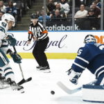 
              San Jose Sharks' Radim Simek (51) shoots on Toronto Maple Leafs goaltender Ilya Samsonov during the first period of an NHL hockey game Wednesday, Nov. 30, 2022, in Toronto. (Chris Young/The Canadian Press via AP)
            