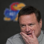 
              FILE - Kansas head coach Bill Self speaks during a news conference about the Men's Final Four NCAA basketball tournament, April 3, 2022, in New Orleans. Kansas suspended Hall of Fame coach Bill Self and top assistant Kurtis Townsend for the first four games of the season Wednesday, Nov. 2, 2022, along with imposing several recruiting restrictions, as part of the fallout from a lengthy FBI investigation into college basketball corruption.(AP Photo/Brynn Anderson, File)
            