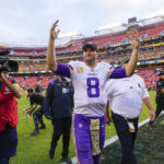 
              Minnesota Vikings quarterback Kirk Cousins (8) acknowledges the fans as he walks off the field at the end of an NFL football game against the Washington Commanders, Sunday, Nov. 6, 2022, in Landover, Md. Vikings won 20-17. (AP Photo/Julio Cortez)
            