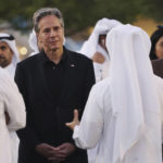 
              U.S. Secretary of State Anthony Blinken, left, and Vice Chairperson and CEO of Qatar Foundation, Sheikha Hind bint Hamad al-Thani, right, listen to officials during a visit to Oxygen Park at Education City, in Doha Qatar, Monday, Nov. 21, 2022. (Karim Jaafar/Pool via AP)
            