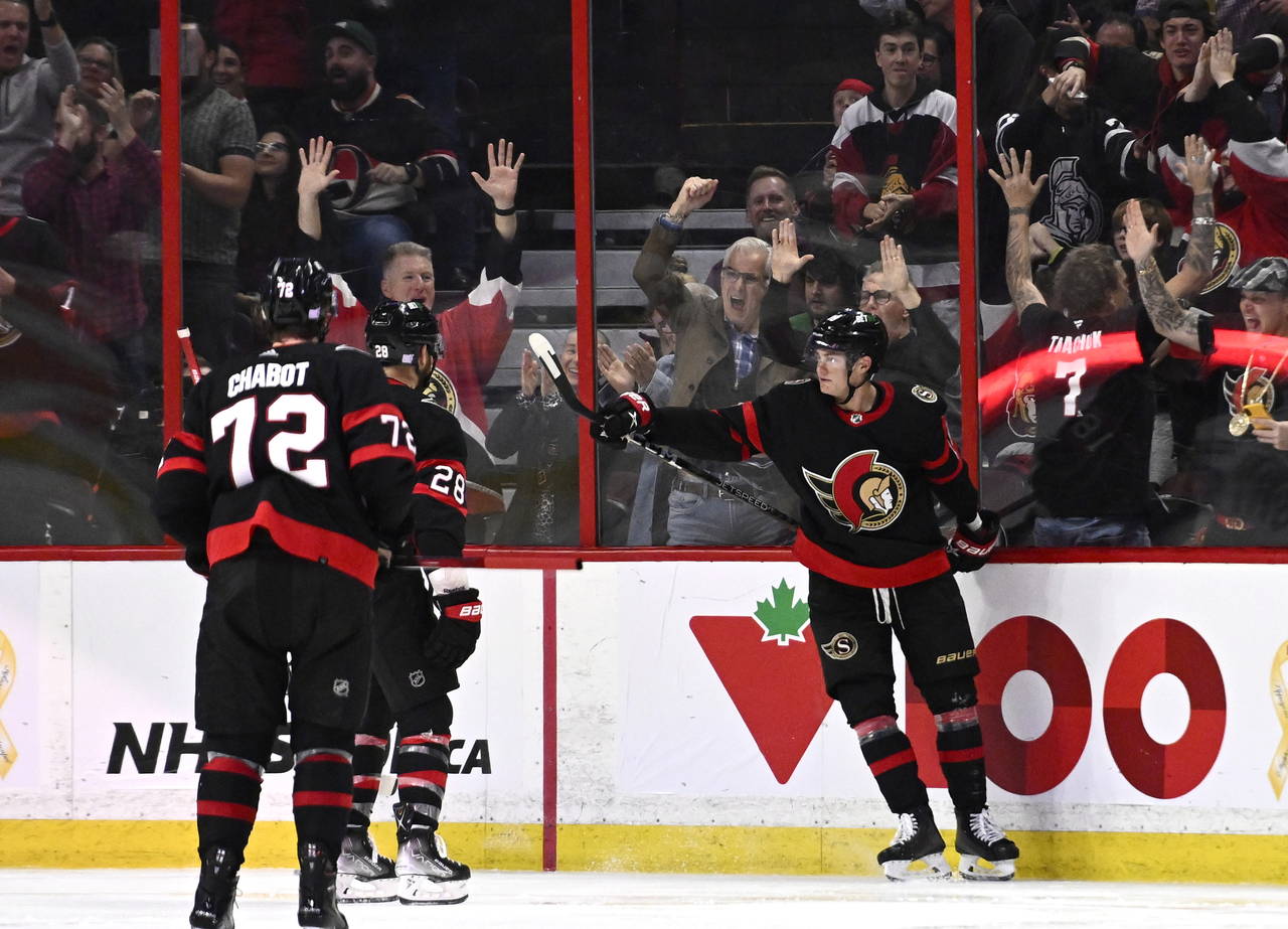 Ottawa Senators left wing Tim Stutzle (18) celebrates after his goal against the Vegas Golden Knigh...