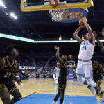 
              UCLA guard Jaime Jaquez Jr. (24) shoots against Long Beach State during the first half of an NCAA college basketball game Friday, Nov. 11, 2022, in Los Angeles. (AP Photo/Marcio Jose Sanchez)
            