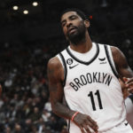 
              Brooklyn Nets' Kyrie Irving reacts during the second half of the team's NBA basketball game against the Toronto Raptors on Wednesday, Nov. 23, 2022, in Toronto. (Chris Young/The Canadian Press via AP)
            