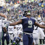 
              Seattle Seahawks running back Kenneth Walker III (9) celebrates his rushing touchdown against the Las Vegas Raiders during the second half of an NFL football game Sunday, Nov. 27, 2022, in Seattle. (AP Photo/Gregory Bull)
            