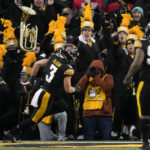 
              Iowa defensive back Cooper DeJean (3) celebrates after returning an interception for a touchdown during the first half of an NCAA college football game against Wisconsin, Saturday, Nov. 12, 2022, in Iowa City, Iowa. (AP Photo/Charlie Neibergall)
            