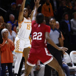 
              Tennessee guard Jasmine Powell (15) shoots over Indiana guard Chloe Moore-McNeil (22) during the first half of an NCAA college basketball game, Monday, Nov. 14, 2022, in Knoxville, Tenn. (AP Photo/Wade Payne)
            