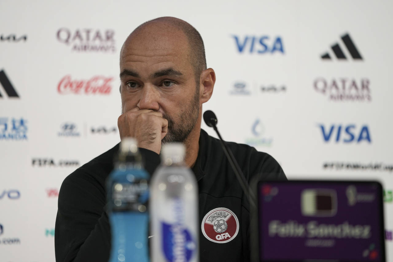 Qatar's head coach Felix Sanchez listens to a question during a press conference, in Doha, Qatar, S...