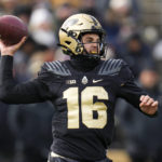 
              Purdue quarterback Aidan O'Connell (16) throws against Northwestern during the first half of an NCAA college football game in West Lafayette, Ind., Saturday, Nov. 19, 2022. (AP Photo/Michael Conroy)
            