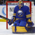 
              Buffalo Sabres goaltender Craig Anderson (41) makes a pad save during the second period of an NHL hockey game against the Vancouver Canucks, Tuesday, Nov. 15, 2022, in Buffalo, N.Y. (AP Photo/Jeffrey T. Barnes)
            