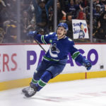 
              Vancouver Canucks' Andrei Kuzmenko celebrates his third goal against the Anaheim Ducks, during the third period of an NHL hockey game Thursday, Nov. 3, 2022, in Vancouver, British Columbia. (Ben Nelms/The Canadian Press via AP)
            