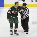 
              Minnesota Wild left wing Marcus Foligno (17) reacts after being ejected from play during the second period of an NHL hockey game against the Arizona Coyotes, Sunday, Nov. 27, 2022, in St. Paul, Minn. (AP Photo/Stacy Bengs)
            