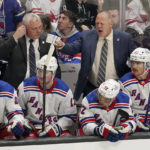 
              New York Rangers coach Gerard Gallant, back right, gestures to players during the third period of the team's NHL hockey game against the San Jose Sharks in San Jose, Calif., Saturday, Nov. 19, 2022. (AP Photo/Jeff Chiu)
            