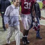 
              Alabama head coach Nick Saban, front left, and linebacker Will Anderson Jr. (31) depart the field after an NCAA college football game against Auburn, Saturday, Nov. 26, 2022, in Tuscaloosa, Ala. (AP Photo/Vasha Hunt)
            