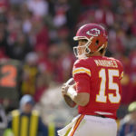 
              Kansas City Chiefs quarterback Patrick Mahomes drops back to pass during the first half of an NFL football game against the Jacksonville Jaguars Sunday, Nov. 13, 2022, in Kansas City, Mo. (AP Photo/Charlie Riedel)
            