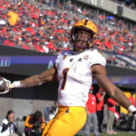 
              Arizona State running back Xazavian Valladay reacts after scoring atouchdown against Arizona in the first half of an NCAA college football game, Friday, Nov. 25, 2022, in Tucson, Ariz. (AP Photo/Rick Scuteri)
            