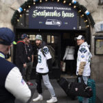 
              Fans of the Seahawks arrive at the Augustiner Original Building Beer Hall with Seattle Seahawks decor in Munich, Germany, Saturday, Nov. 12, 2022. The Tampa Bay Buccaneers will take on the Seattle Seahawks at Munich in the first ever regular season NFL football game in Germany this Sunday. (AP Photo/Markus Schreiber)
            
